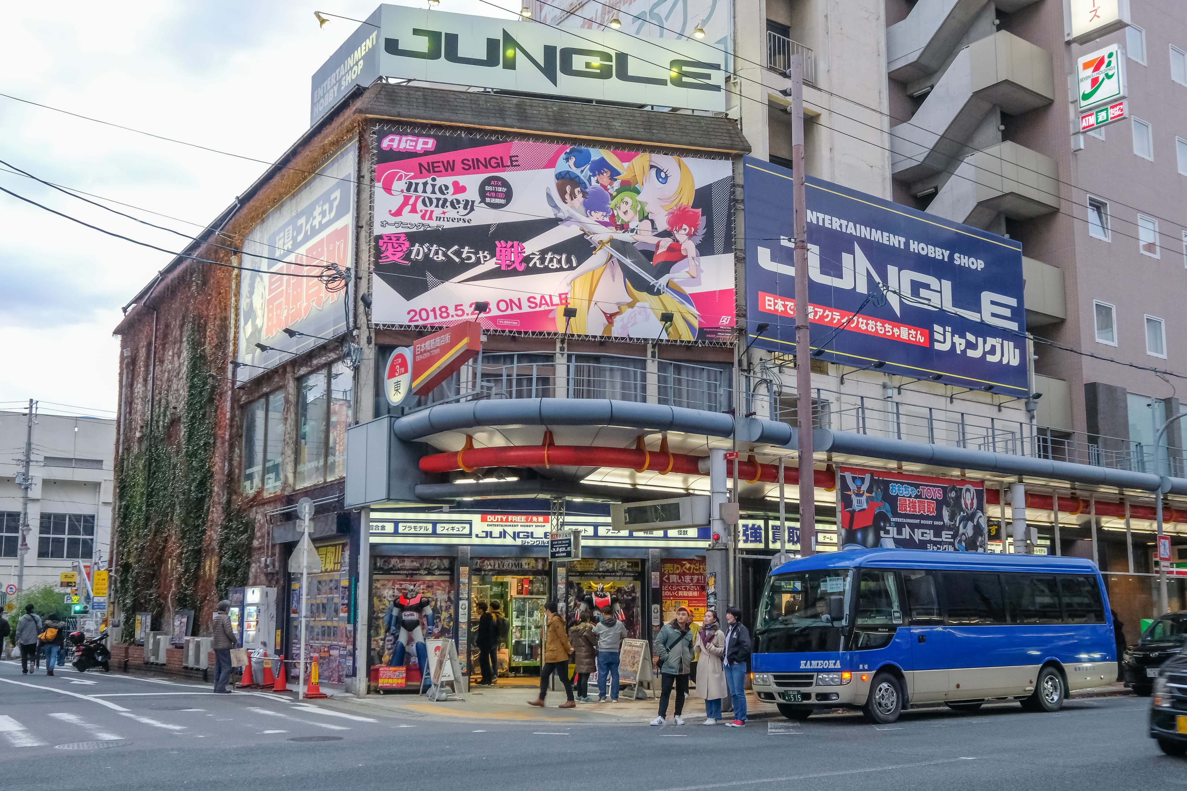 Vibrant streets of Nippombashi with anime shops and colorful signage
